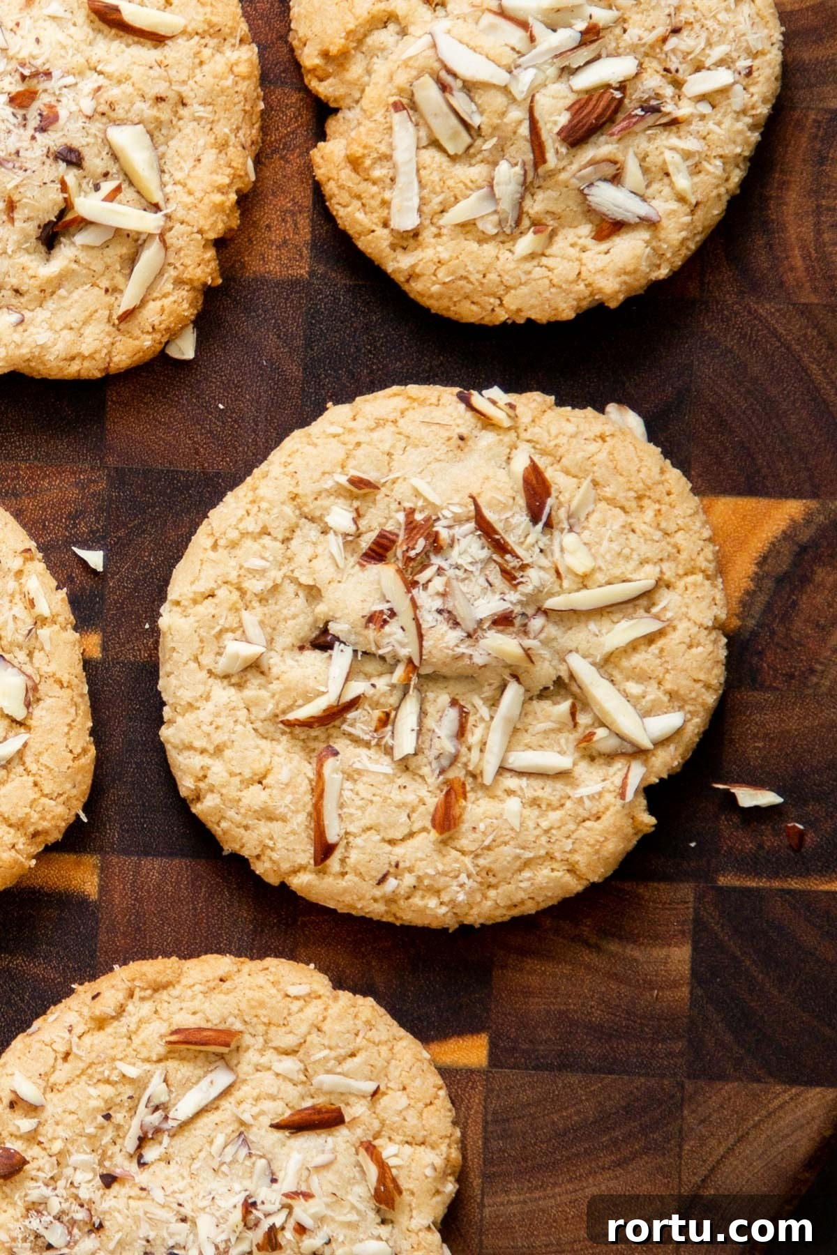 Gluten-Free Vegan Almond Joy Cookies Recipe 13 glutenfree almond joy cookies on a wooden chopping board