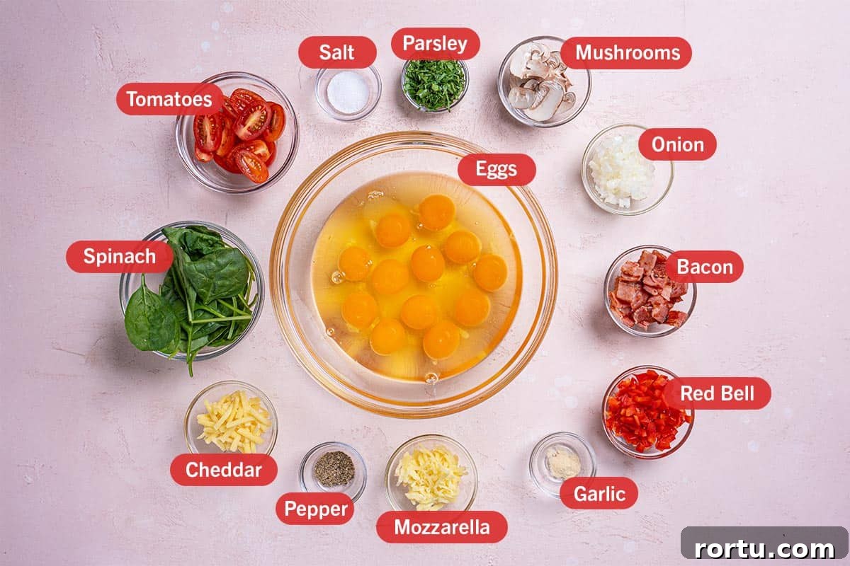 Image of all the ingredients needed for the preparation of this recipe, specifically: eggs, salt, parsley, mushrooms, onion, bacon, red bell, garlic, mozzarella, pepper, cheddar, spinach, tomatoes.