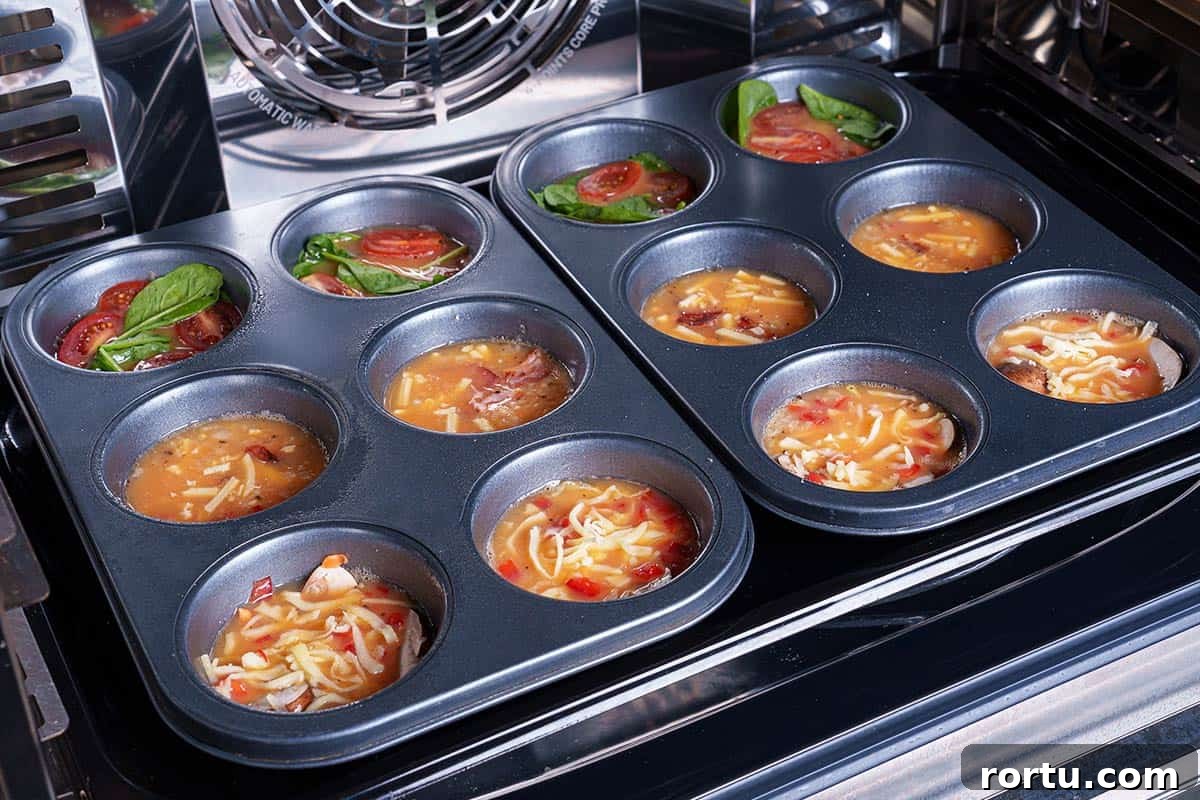 The image shows the muffin tins being placed in the oven to bake for about 15 to 20 minutes, or until set.