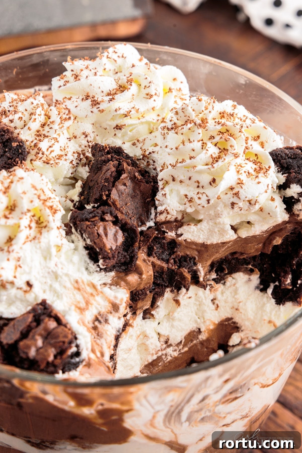 Overhead view of Brownie Trifle Recipe with a serving missing.