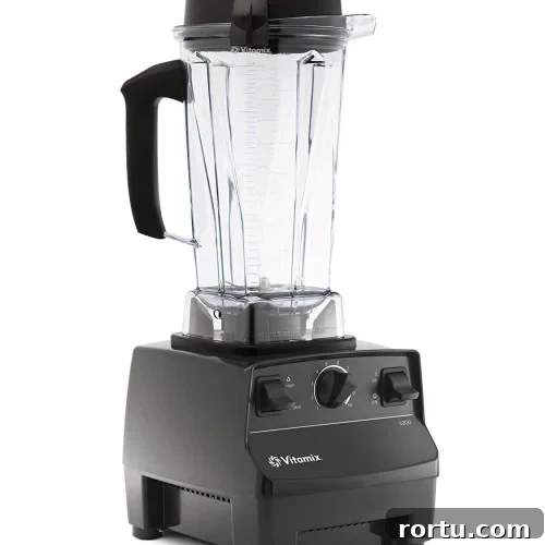 A black blender with a clear pitcher.