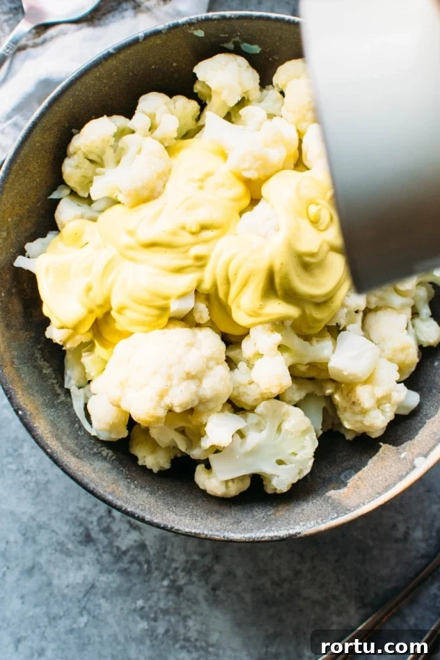 Dairy-Free Cauliflower Mac and Cheese (Vegan & Paleo) 4 Easy dairy free cauliflower mac and cheese is the healthiest and most delicious way to satisfy your comfort food cravings without any regrets!