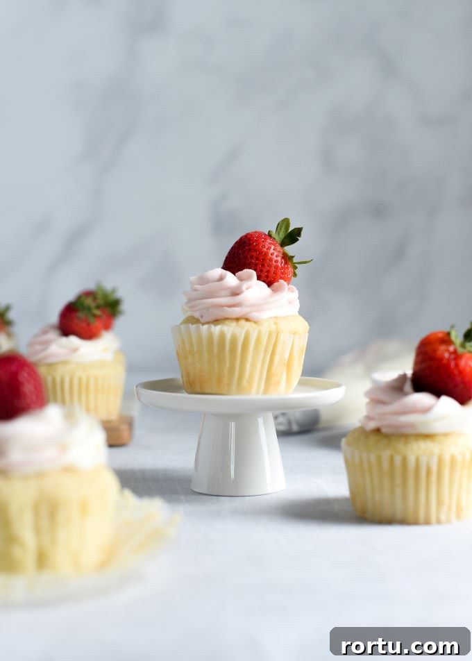 Zesty Lemon Strawberry Cupcakes with Cream Cheese Frosting 7 img 547 6