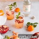 Satsuma Pomegranate Paloma with Fresh Fruit - The Heirloom Pantry