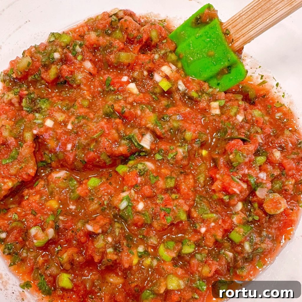 Salsa stirred and in a bowl.