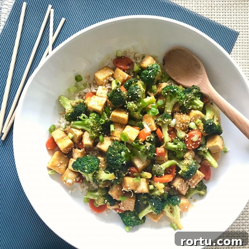 Tofu Stir-Fry With Broccoli and Carrots via LizsHealthyTable.com #familymealsmonth