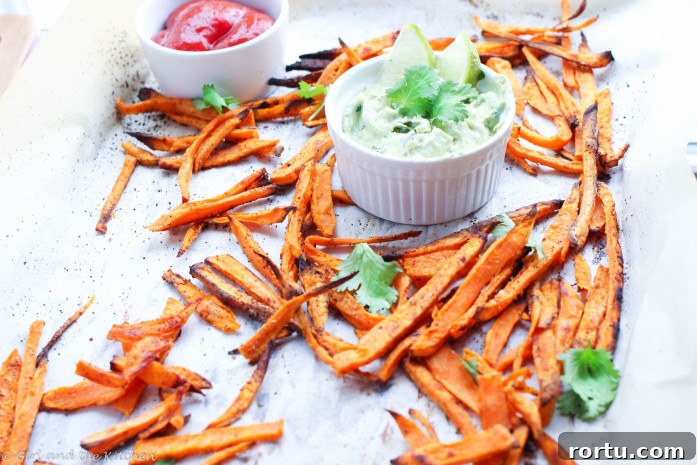 Learn how to make baked sweet potato fries that are super crispy, spicy and perfectly dipped in a healthy aioli!