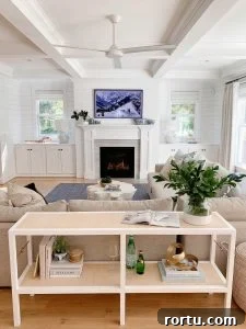 Samsung Frame tv in living room over fireplace