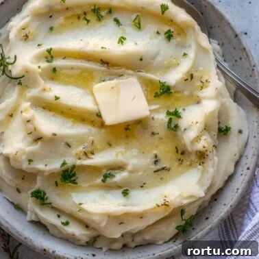 Square image of rosemary garlic mashed potatoes.