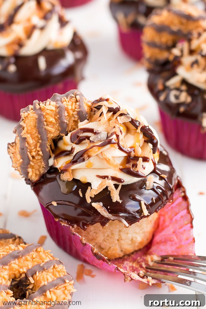 These Girl Scout Cookie Samoa Cupcakes are a rich chocolaty, caramel, and toasted coconut dream come true!