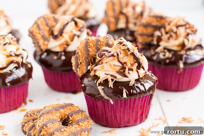These Girl Scout Cookie Samoa Cupcakes are a rich chocolaty, caramel, and toasted coconut dream come true!