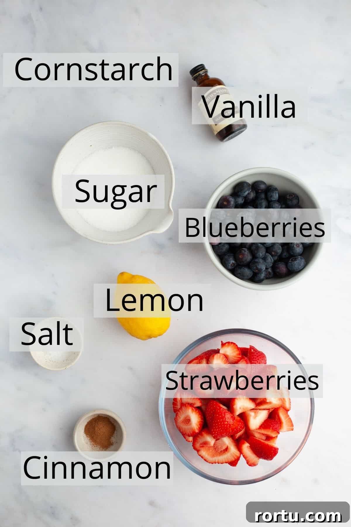Strawberry and Blueberry Summer Pie Recipe: Fresh Berry Tart 4 All the ingredients needed for a strawberry blueberry pie filling weighed out into small bowls.