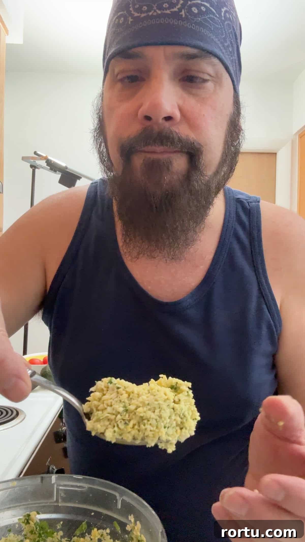 Scooping and shaping falafel mixture before air frying.