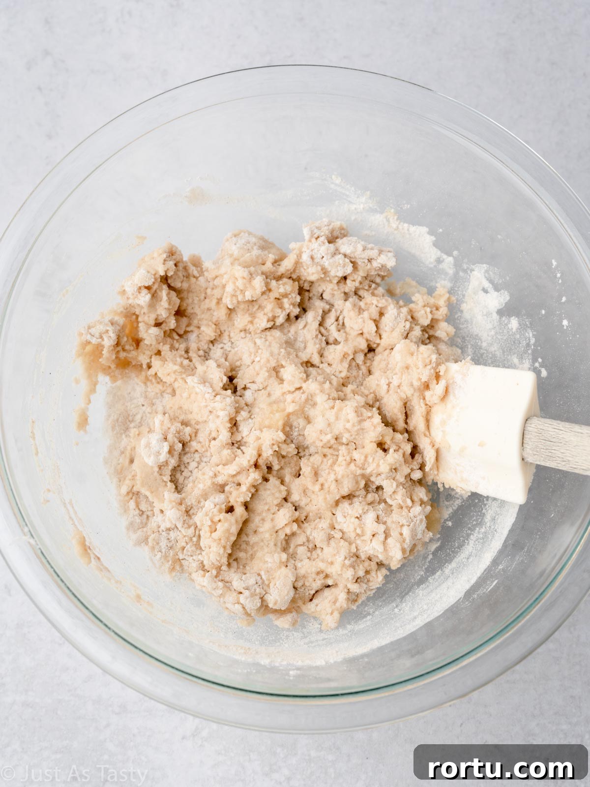 Apple fritter batter in a bowl.