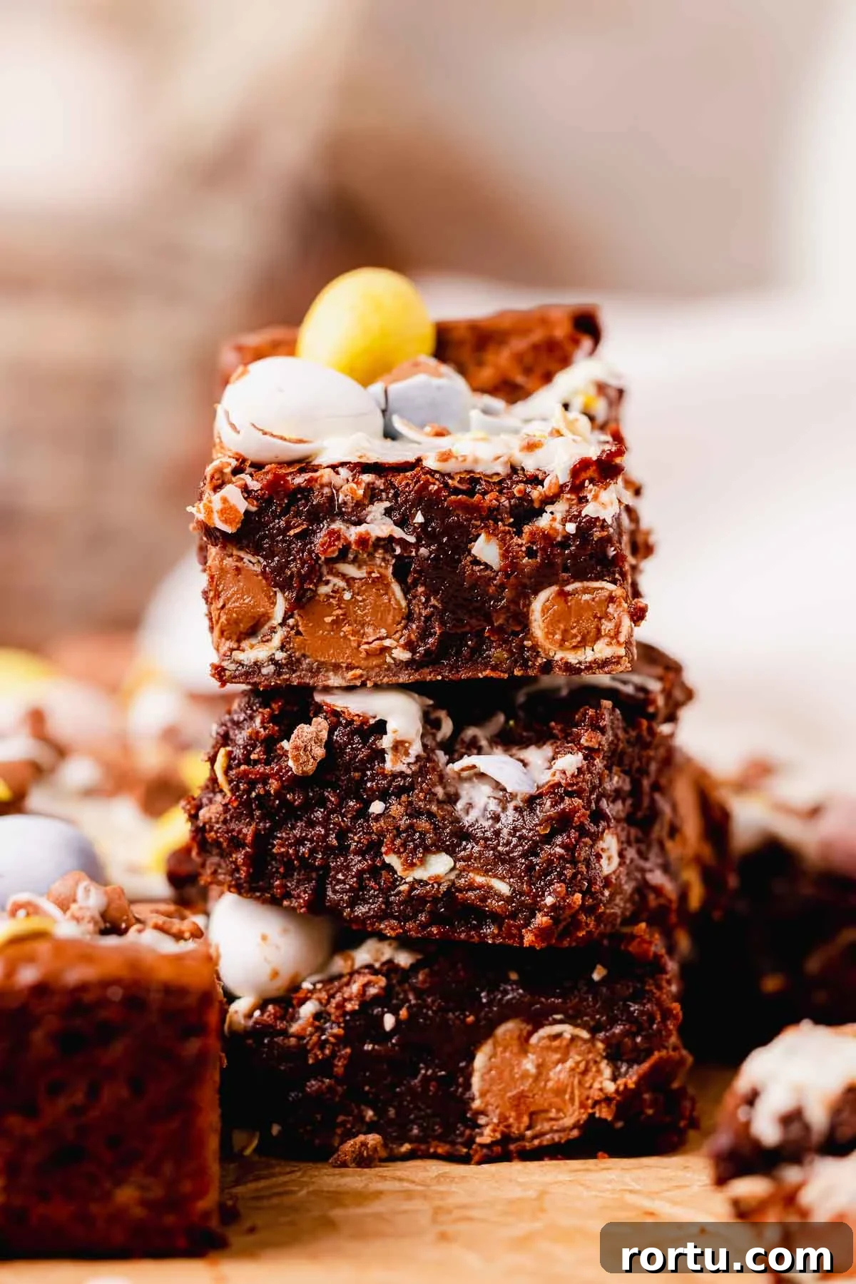 Mini Egg Chocolate Brownies with Melted Candy Centers 4 stack of three mini egg brownie squares