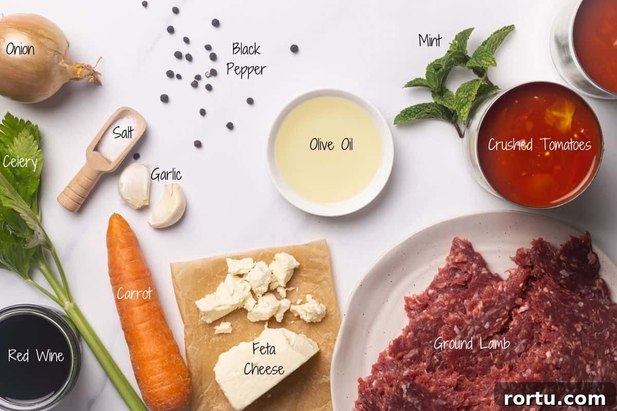 Lamb Ragu Recipe: Slow-Simmered Sauce with Parmesan 3 Lamb Ragu Ingredients on a linen surface.