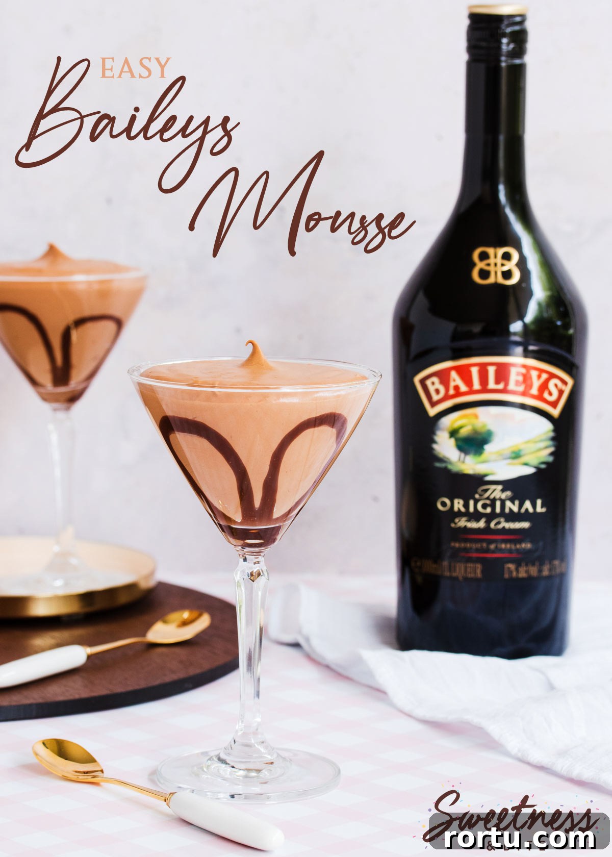 Creamy Baileys Chocolate Mousse Recipe 2 Two cocktail glasses filled with mousse, with a Baileys bottle in the background, text overlay reads: "Easy Baileys Mousse".