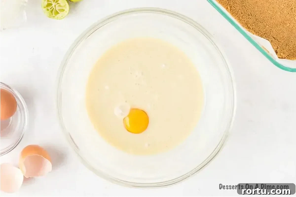 Eggs added to bowl. 