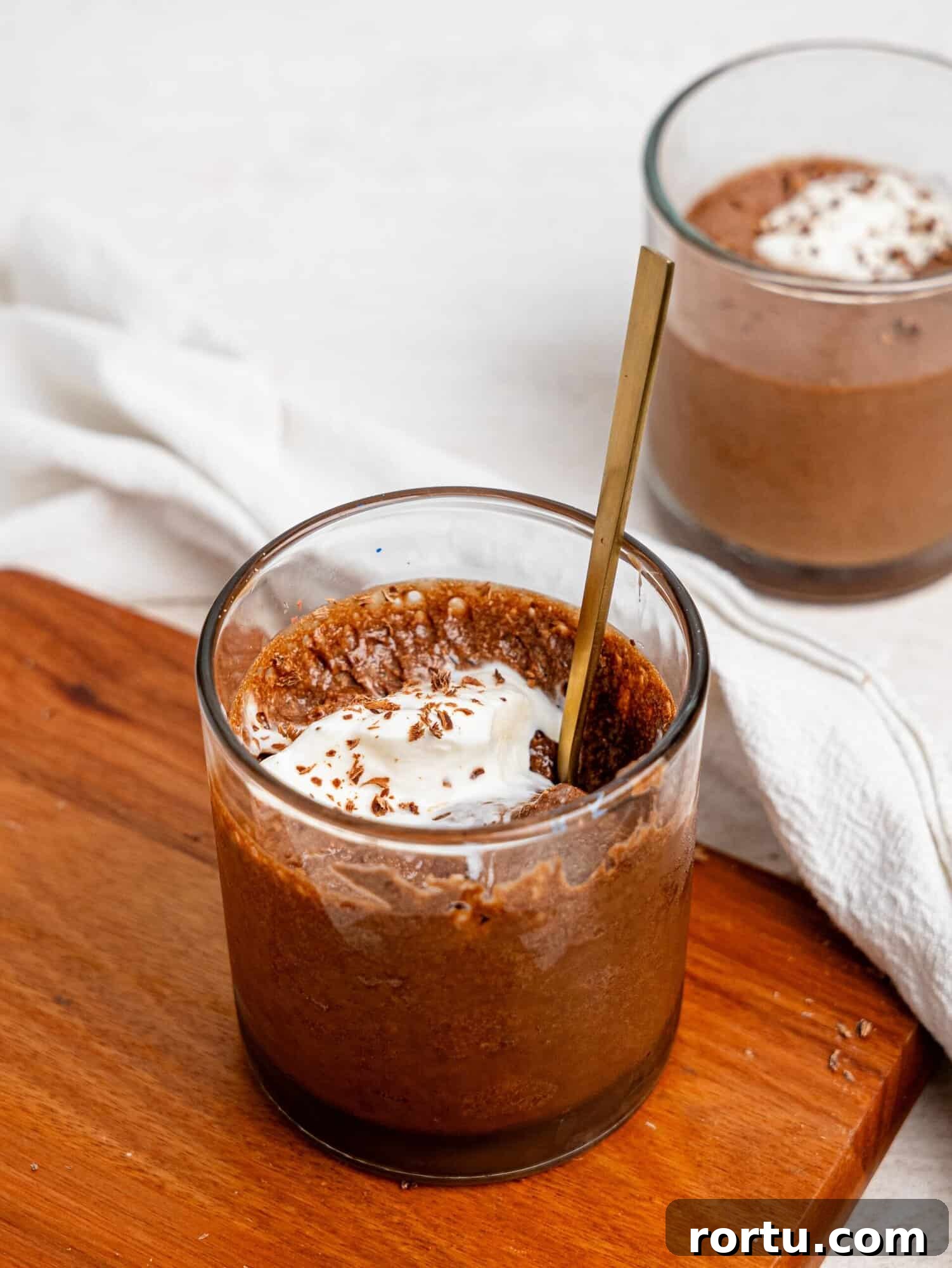 High-Protein Chocolate Mousse Recipe for Muscle Recovery 9 Chocolate Protein Mousse in a glass cup.