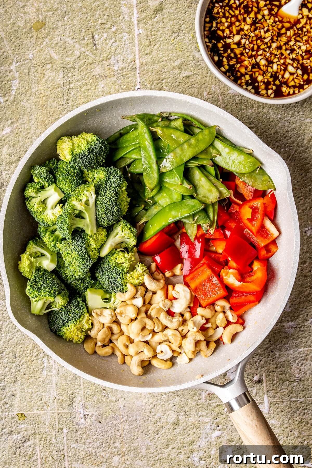 One-Skillet Cashew Chicken Stir-Fry Recipe for Weeknights 9 How to Make One Skillet Cashew Chicken Step 3 - Olivia Adriance