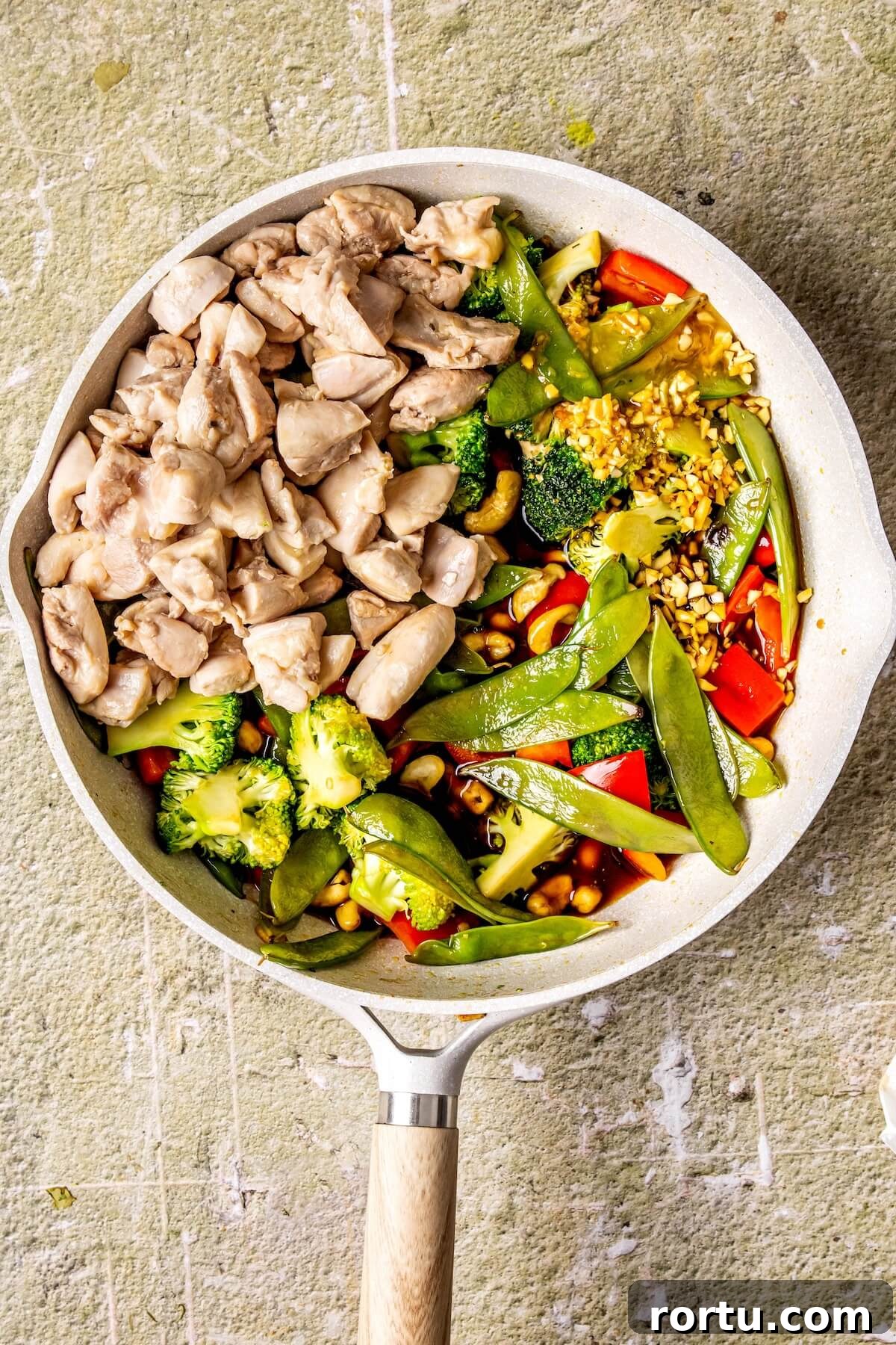 One-Skillet Cashew Chicken Stir-Fry Recipe for Weeknights 10 How to Make One Skillet Cashew Chicken Step 4 - Olivia Adriance
