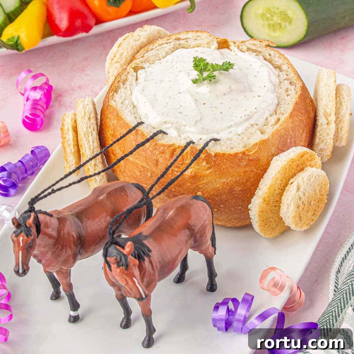 The Royal Coach Bread Bowl for Dip -> Royal Coach Bread Bowl Recipe for Party Dips 17 A loaf of round bread has been hollowed out and filled with dip then decorated to look like a coach.