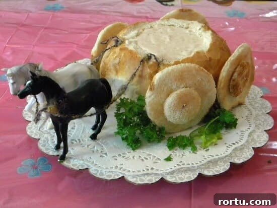 The Royal Coach Bread Bowl for Dip -> Royal Coach Bread Bowl Recipe for Party Dips 18 A round loaf of bread that has been hollowed out and filled with dip then decorated to look like a coach.