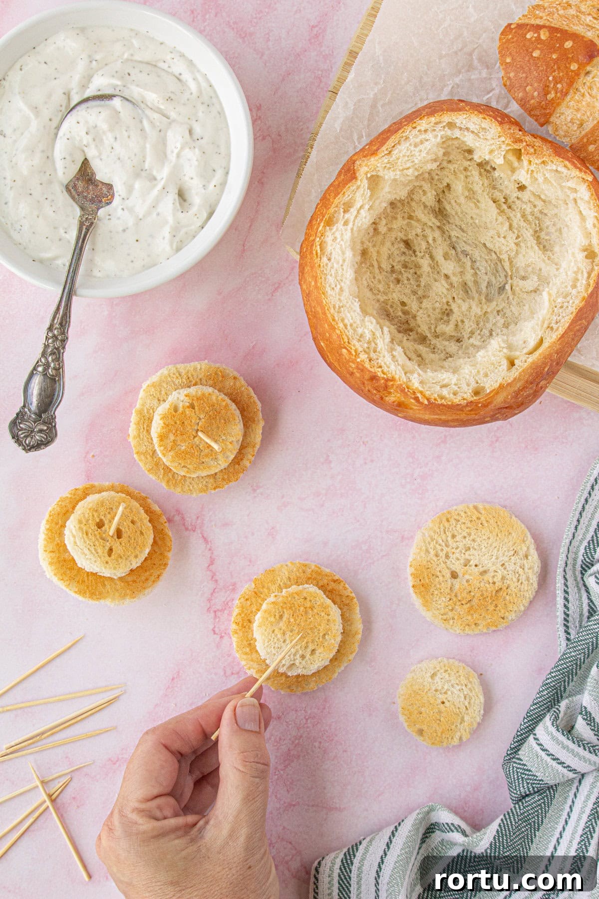 The Royal Coach Bread Bowl for Dip -> Royal Coach Bread Bowl Recipe for Party Dips 7 Overhead view of assembling the wheels.