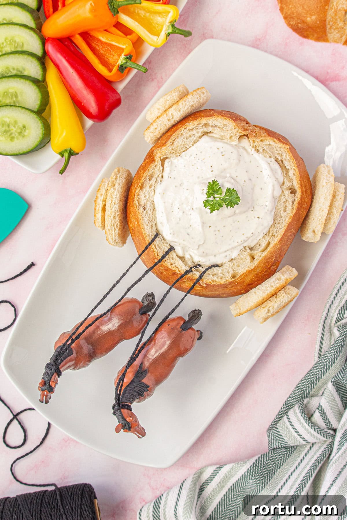 The Royal Coach Bread Bowl for Dip -> Royal Coach Bread Bowl Recipe for Party Dips 9 Overhead view of the dip in the bread bowl and the horses attached.