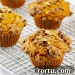 Pumpkin Muffins with Pecan Streusel Recipe 8 Easy Pumpkin Muffins with Pecan Streusel on wire cooking rack