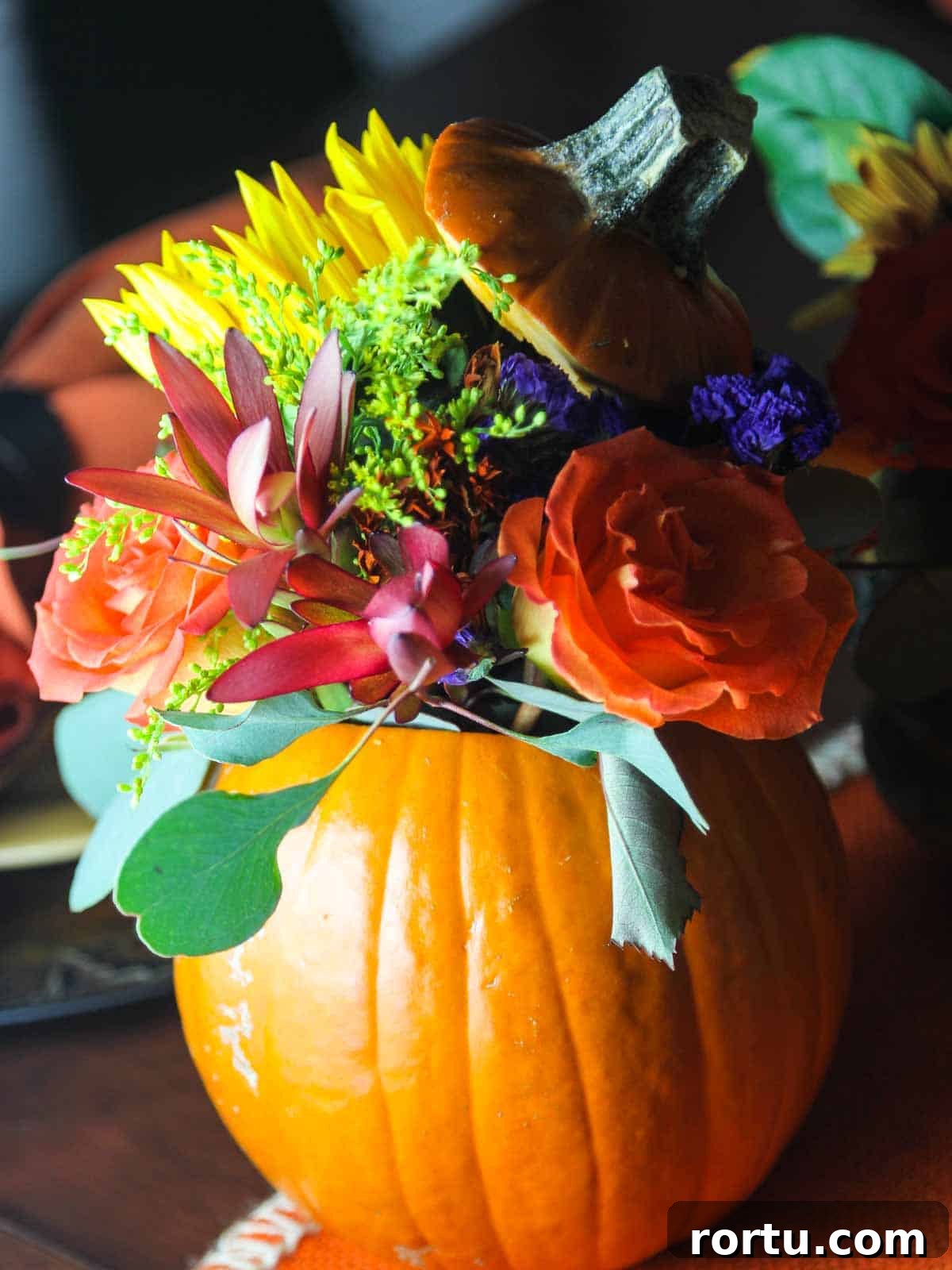 Orange pumpkin with flowers