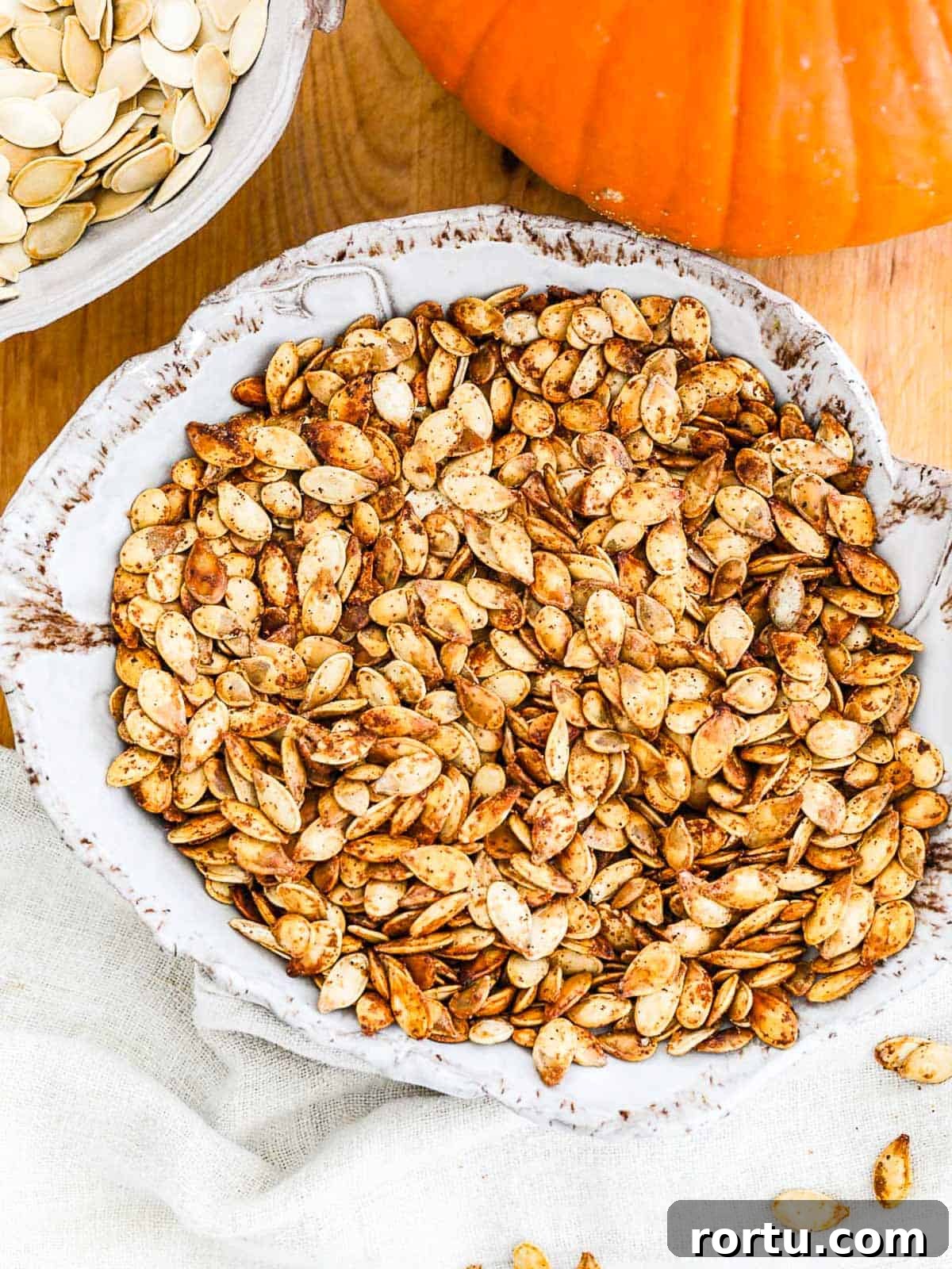 Bowl of seasoned roasted pumpkin seeds