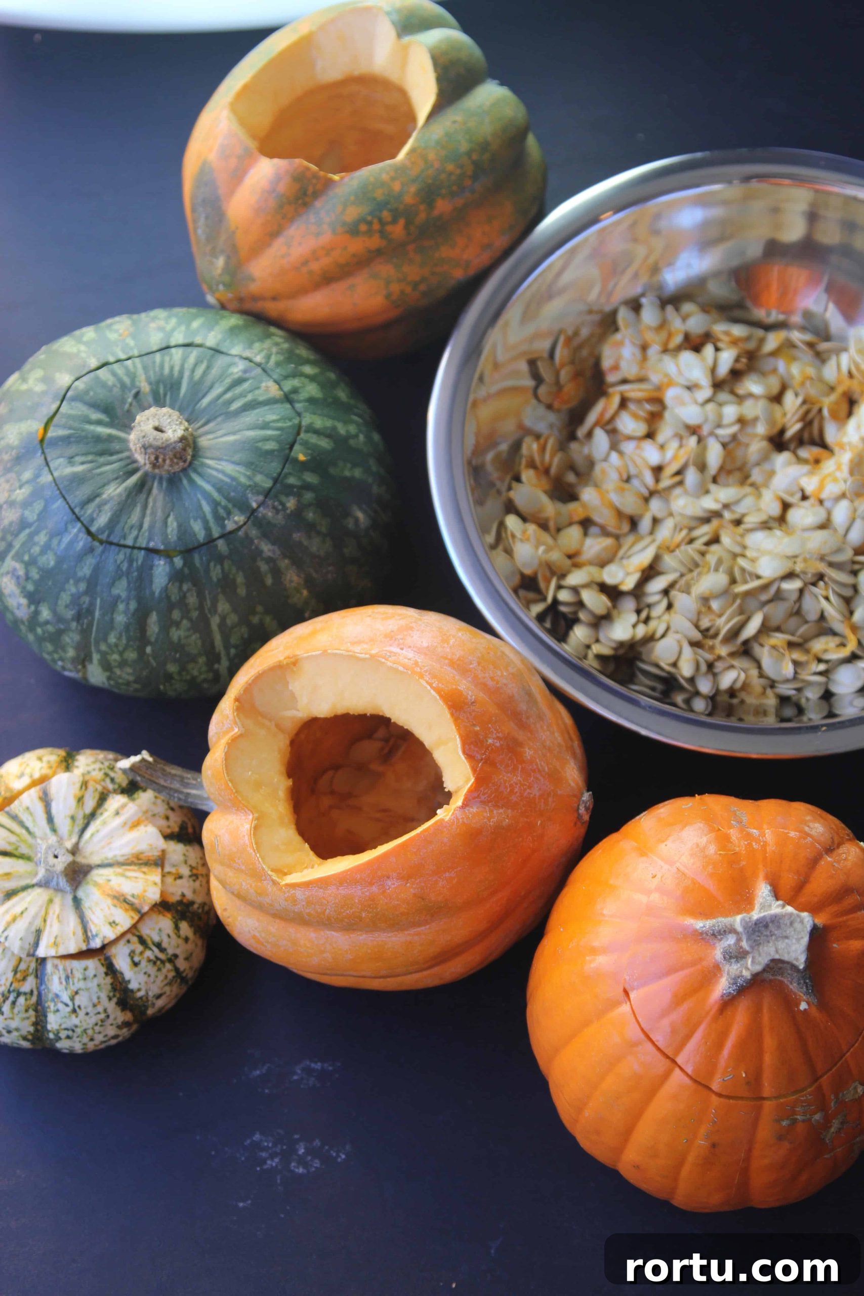 Carving pumpkins and scooping seeds