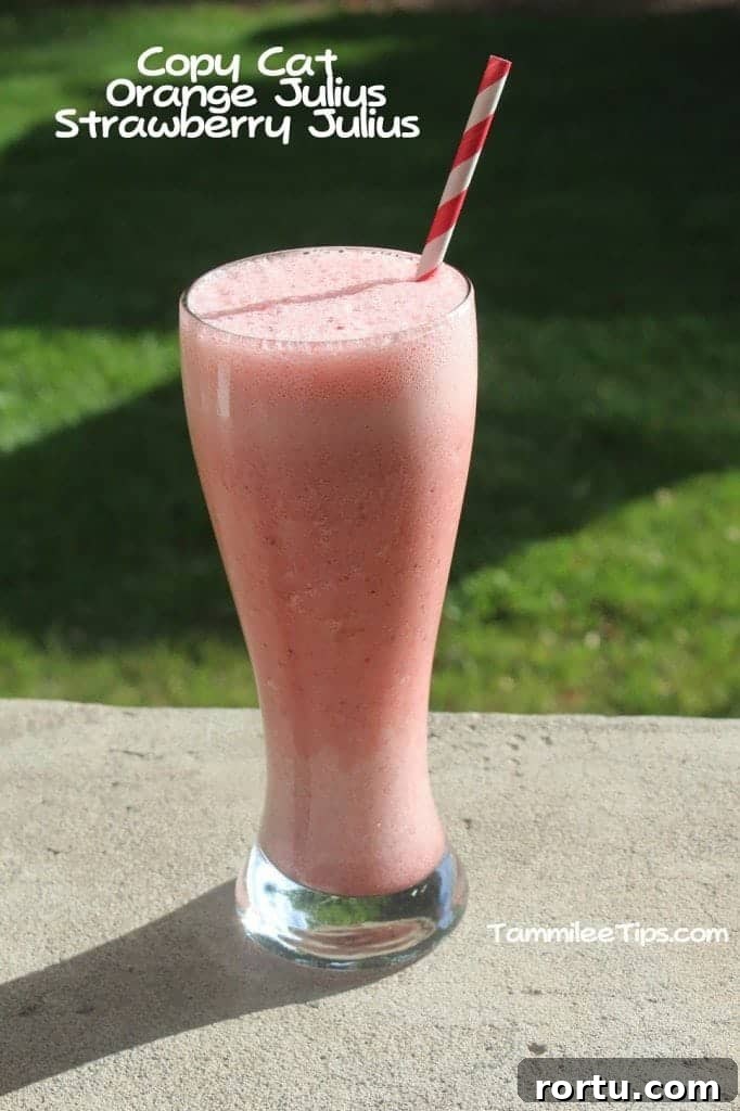 Copycat Orange Julius Strawberry Julius next to a tall glass with a pink drink