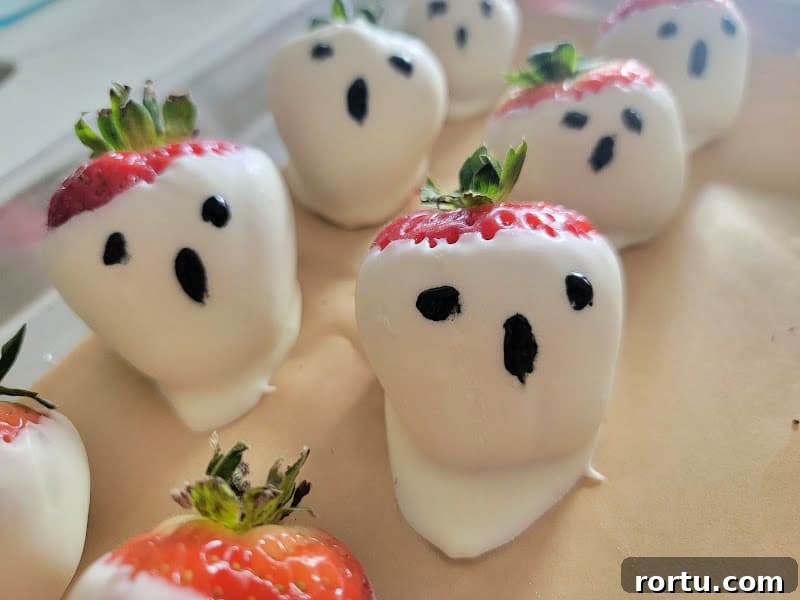 Ghost strawberries on parchment paper