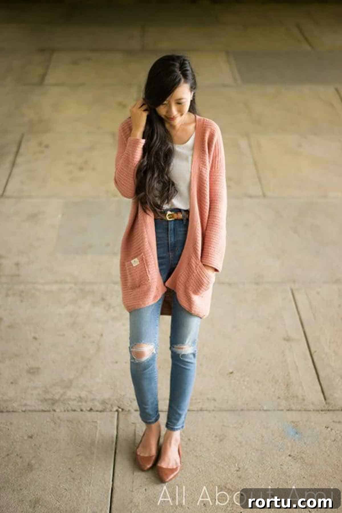 All About Ami Image shows a pink crochet cardigan on woman. -Skip To My Lou
