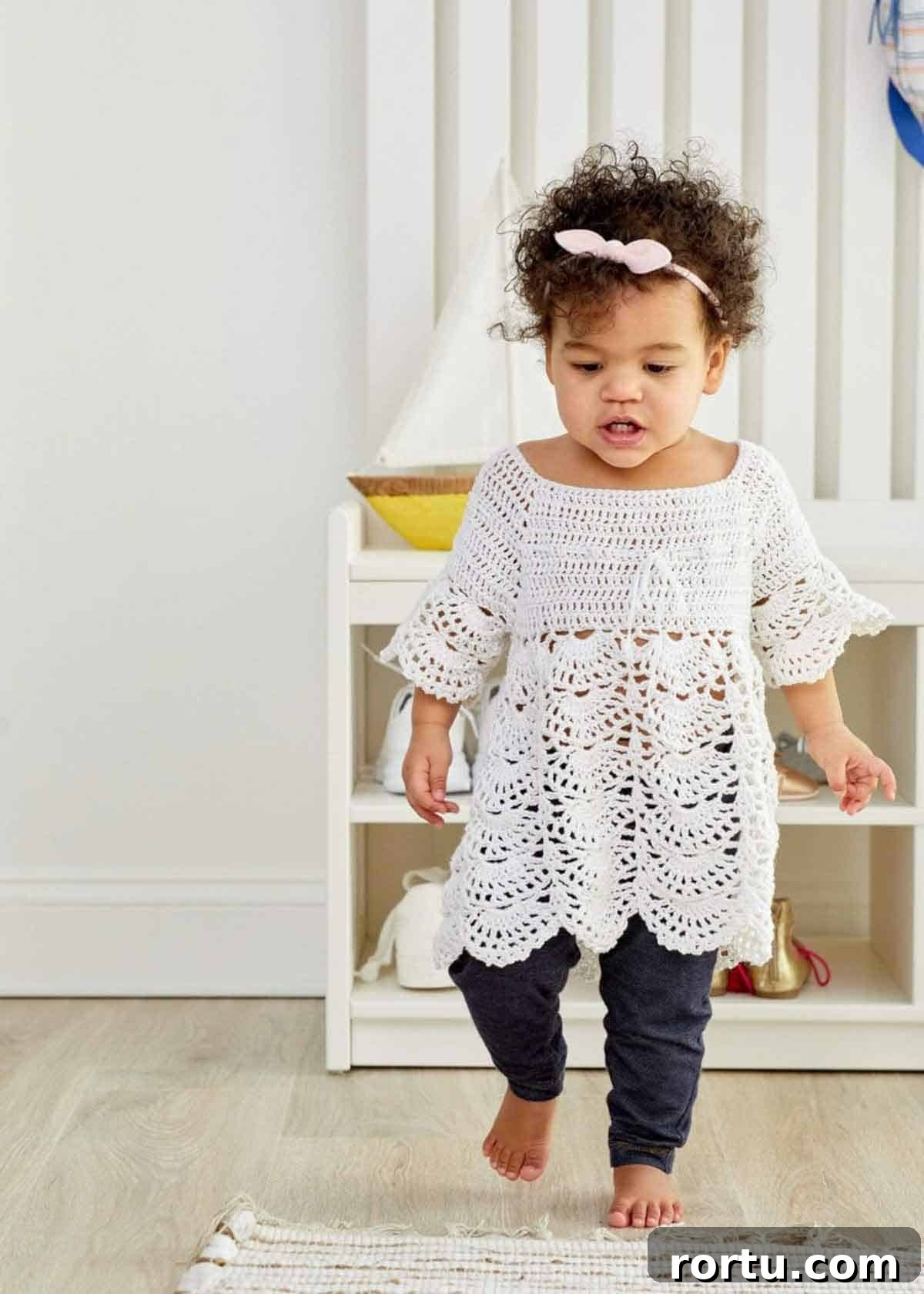 Image shows a white Boho Baby Lace Dress on toddler. -Skip To My Lou