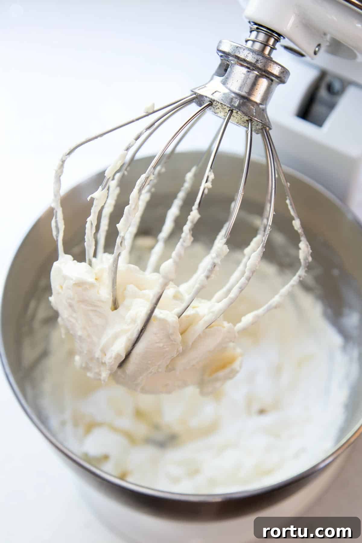 Cream cheese frosting in a stand mixer.